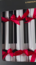 Load and play video in Gallery viewer, Novelty, "Christmas Music Party" - Box of 8 | Bonbon Crackers
